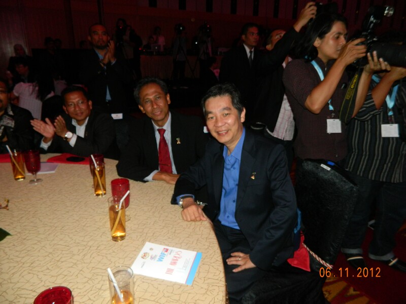 Next to Naser Jaafar of AIM Next to Naser Jaafar of AIM